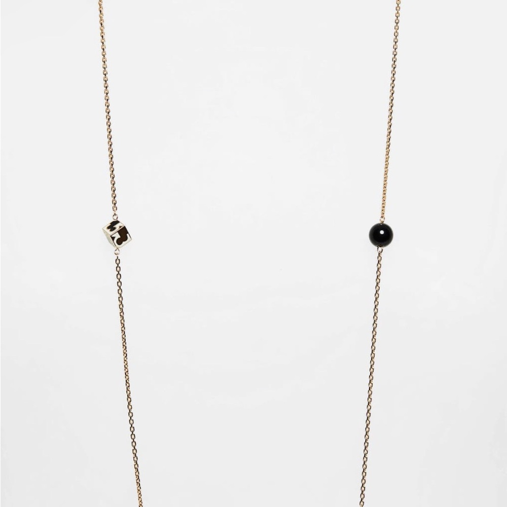 Elegant Gold and Black Necklace